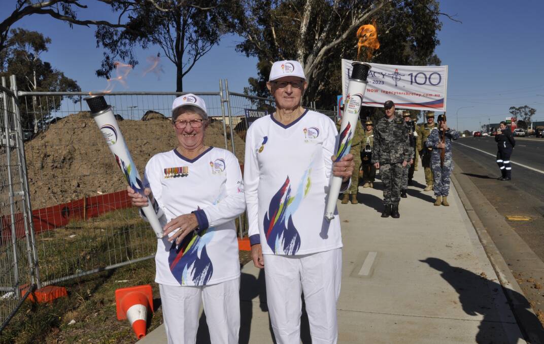 Legatees Ellen and Greg Seaman, of Crookwell, were proud to take part in the Goulburn leg of the Legacy Centennial Torch Relay in Goulburn on Thursday. Picture by Louise Thrower.