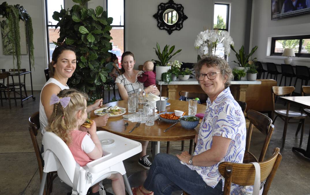 Goulburn art teacher, Barbara Nell, pictured dining with family, was impressed with the decor. Picture by Louise Thrower.