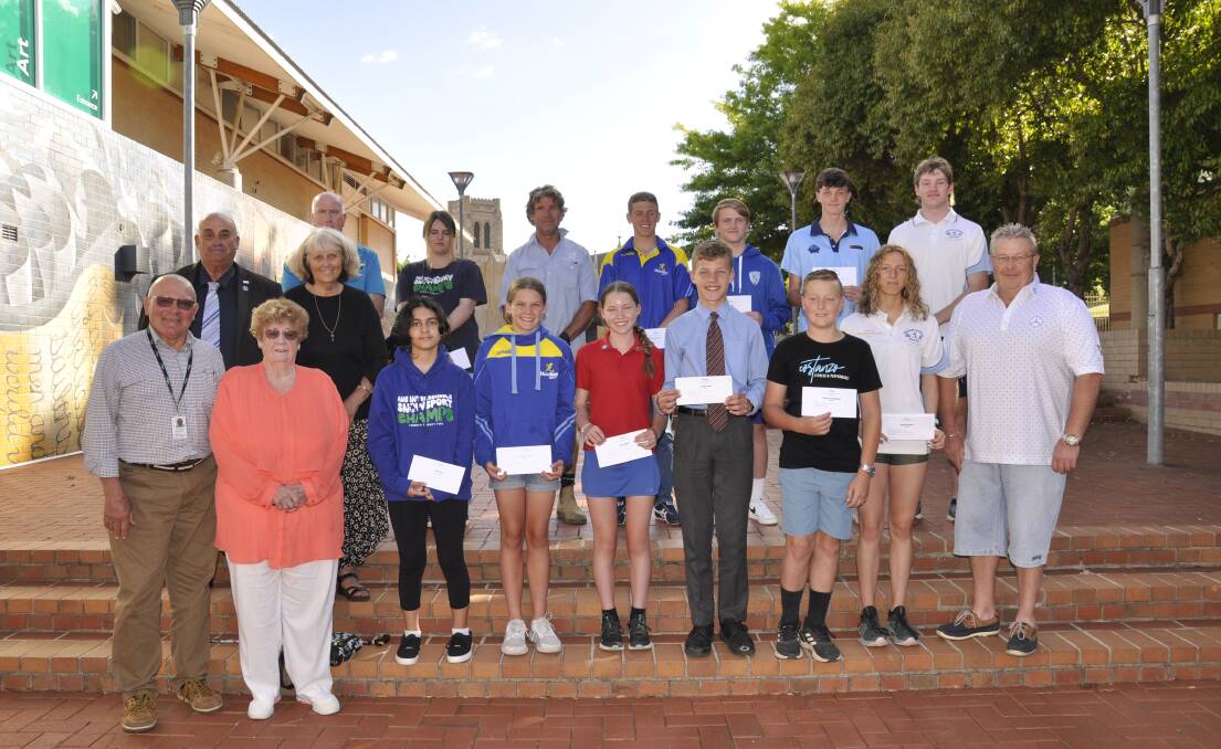 Margaret O'Neill and Ray Harvey Sports Foundation committee members, Mayor Peter Walker and councillors with some of the grant recipients on Tuesday. Picture by Louise Thrower.