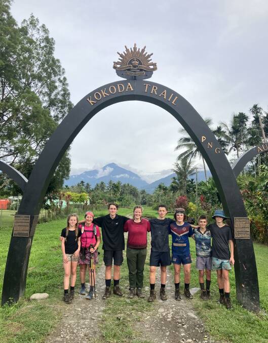 The group was elated after completing the Kokoda Track. From left: Lacey Dyer, Senior Constable Barbara Beard, Rueben Batey, the council's Anna Wishart, Jayden Rumble, Brock Thomas, Kobi Robinson and Archie Hayes. Picture supplied.