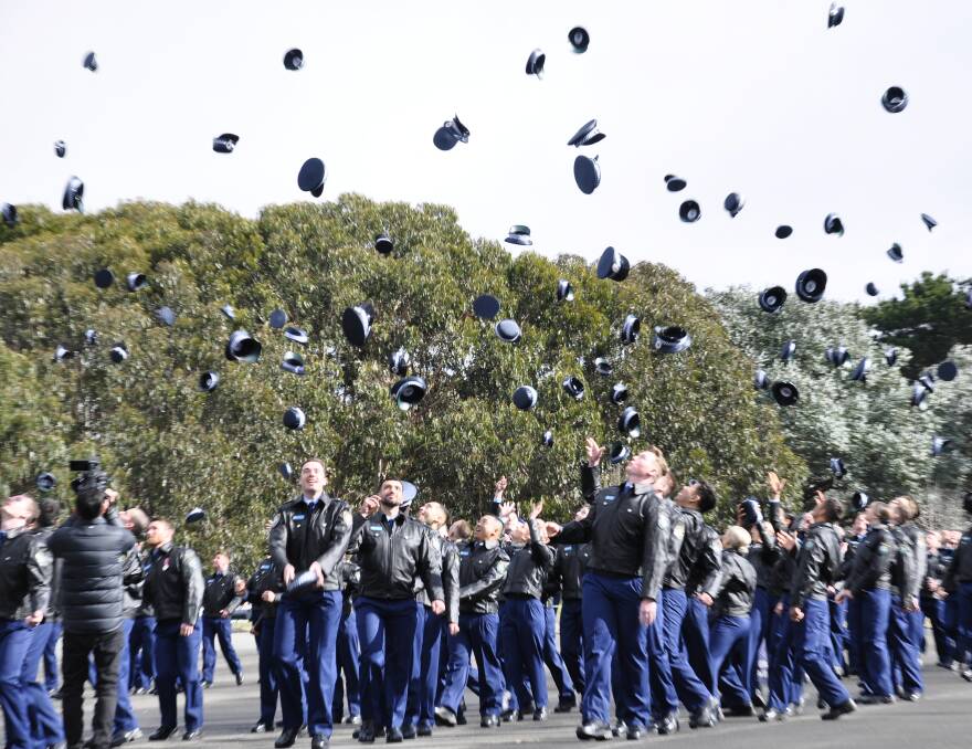 Members of class 362 celebrate their attestation from the NSW Police Academy on Friday. Picture by Louise Thrower.