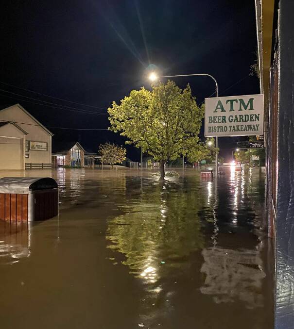 Yass Street, Gunning, outside the Telegraph Hotel turned into a lake on Monday night. Picture by Sue Smith. 