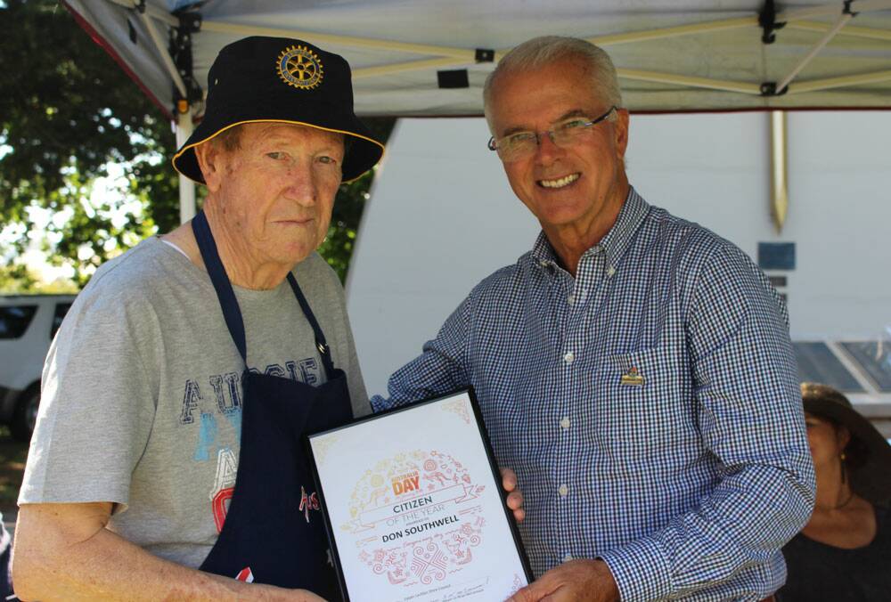 The late Don Southwell was a stalwart of the Crookwell community. He's pictured here with the town's Australia Day ambassador, Gordon Bray, receiving the citizen of the year award. Picture supplied.
