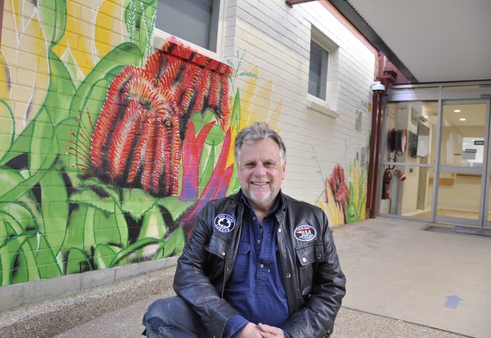 Goulburn signwriter, Tony Marks is pleased with his artwork leading to the new Cancer Care Centre at Goulburn Base Hospital. Picture by Louise Thrower.