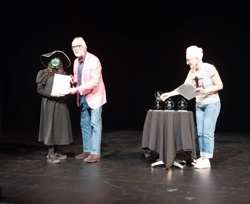 Event sponsor and judge, Mark Bradbury presents the best junior actor award to Goulburn's Lieder Youth Theatre's Jaiyanna Khalil, watched by co-judge, Raina Savage. Picture supplied. 
