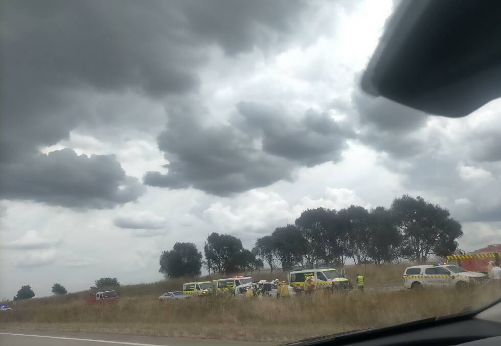 Emergency services attended a van rollover on the Hume Highway near Gunning shortly before 2pm Monday. Picture by Darryl Cardona.
