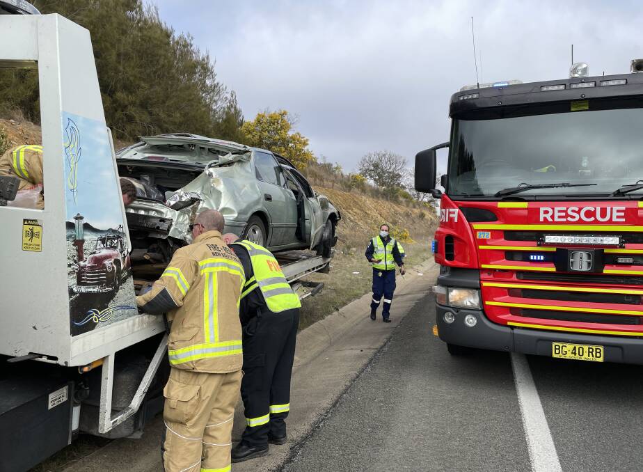 Emergency services attended a single-vehicle rollover on the Hume Highway near Goulburn on Friday morning. Picture by Louise Thrower. 