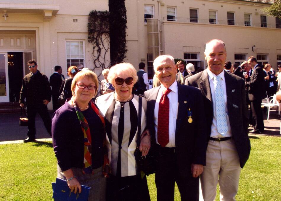 Pat and Ray Leeson with children Janelle Butcher and Ian at Government House in Canberra in 2008 when Ray received his OAM. Picture supplied.
