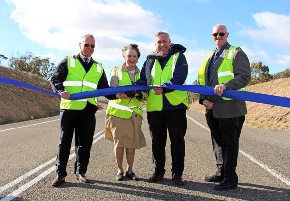 Former Roads Minister Duncan gay (second right) was proud to open the sealed Crookwell to Bathurst Road in May, 2016. He was with former Upper Lachlan Shire Council Mayor John Shaw, then Goulburn MP Pru Goward and former council general manager, John Bell. Picture supplied.