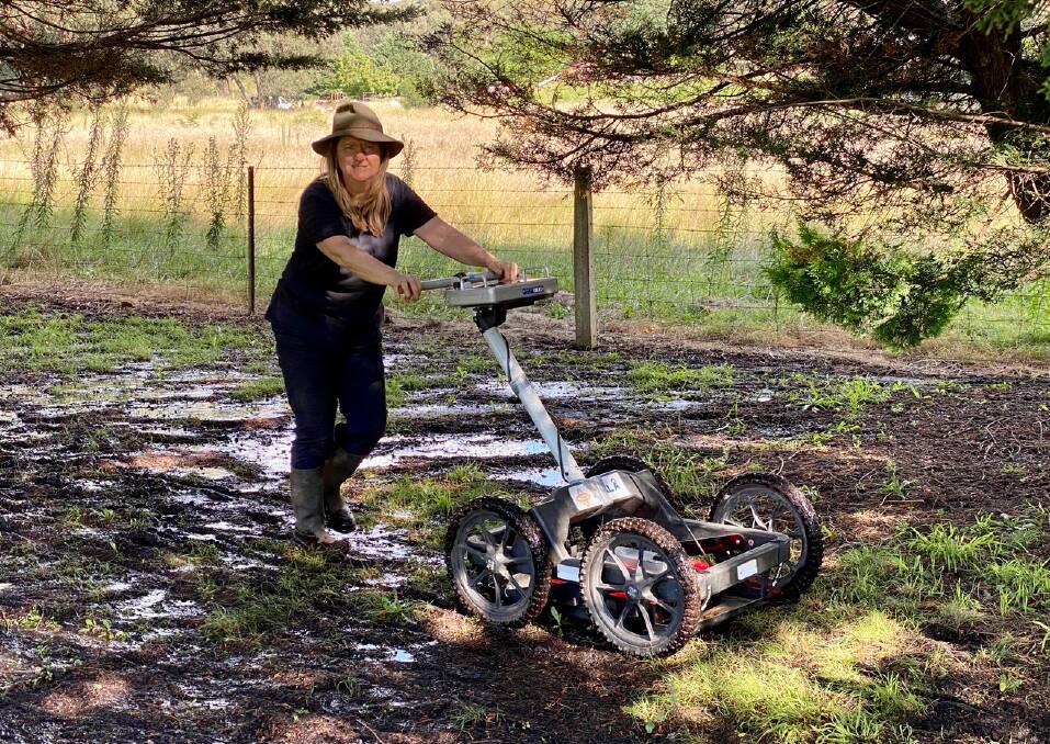 Dr Louise Speding demonstrates the ground penetrating radar equipment, which detects underground items. A demonstration will be held at the Jewish Cemetery in Long Street on Sunday, November 6. Picture supplied.