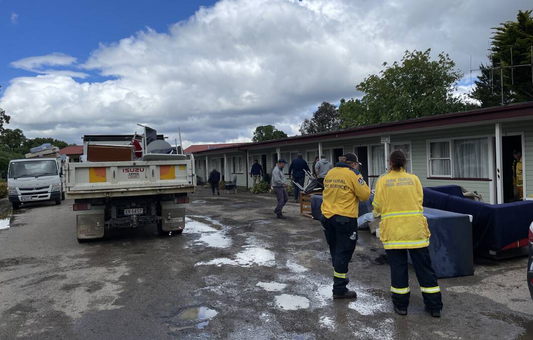 The RFS and community volunteers helped the motel clean-up the day after the storm. Picture by RFS.