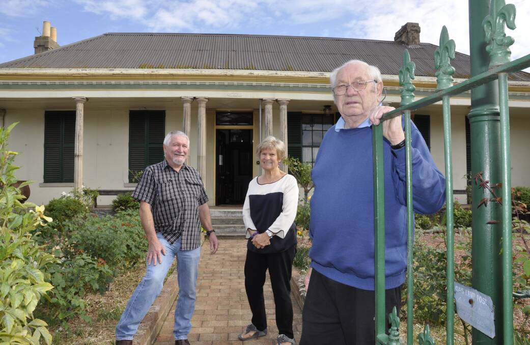 Garry White with Goulburn and District Historical Society members, Roger Bayley and Linda Cooper in 2015 at the Society's then home, Saint Clair. History Goulburn will move back into the premises once restored. Picture by Louise Thrower.