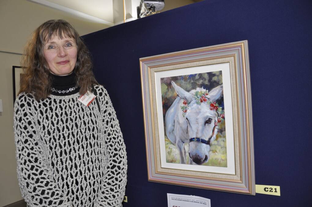Katya Mortensen placed second in the acrylic section for her painting titled 'Donkey Bride' at the 2022 Goulburn and District Art Society's annual art prize. Picture by Louise Thrower.