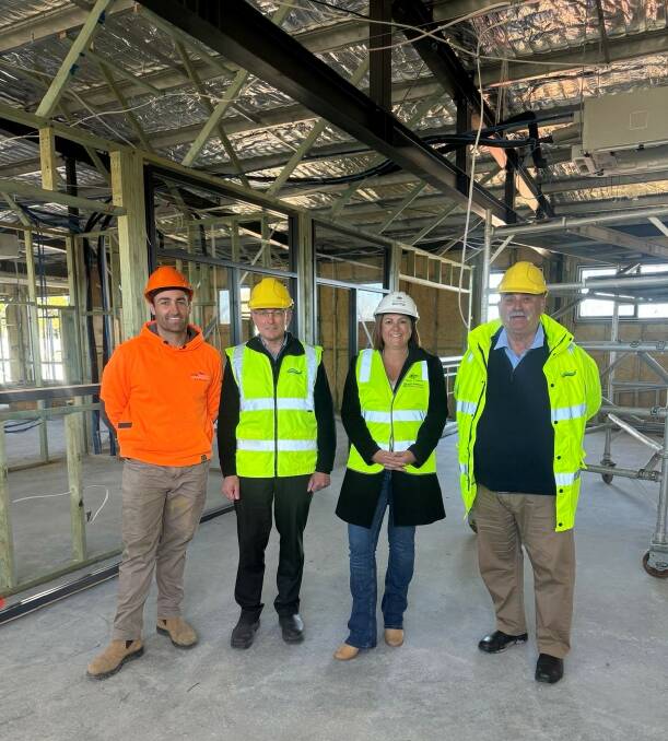 Kristy McBain (second right) and Mayor Peter Walker (right) checked out progress on Goulburn's new SES unit during her visit. Picture supplied.