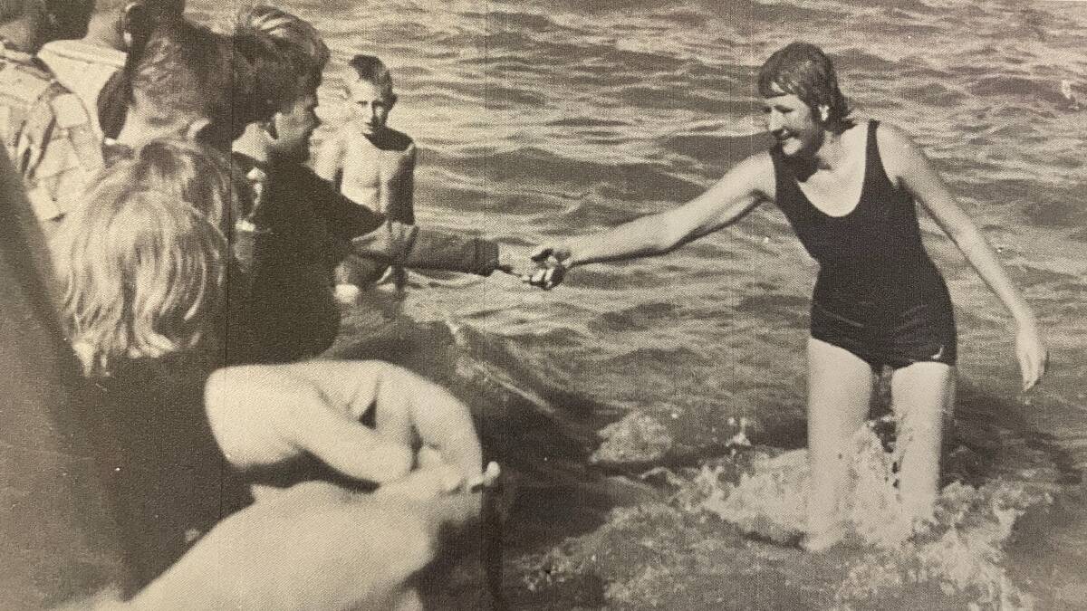 The then 17-year-old Julia Laybutt received warm congratulations after placing third in the Lake George race. Picture supplied.