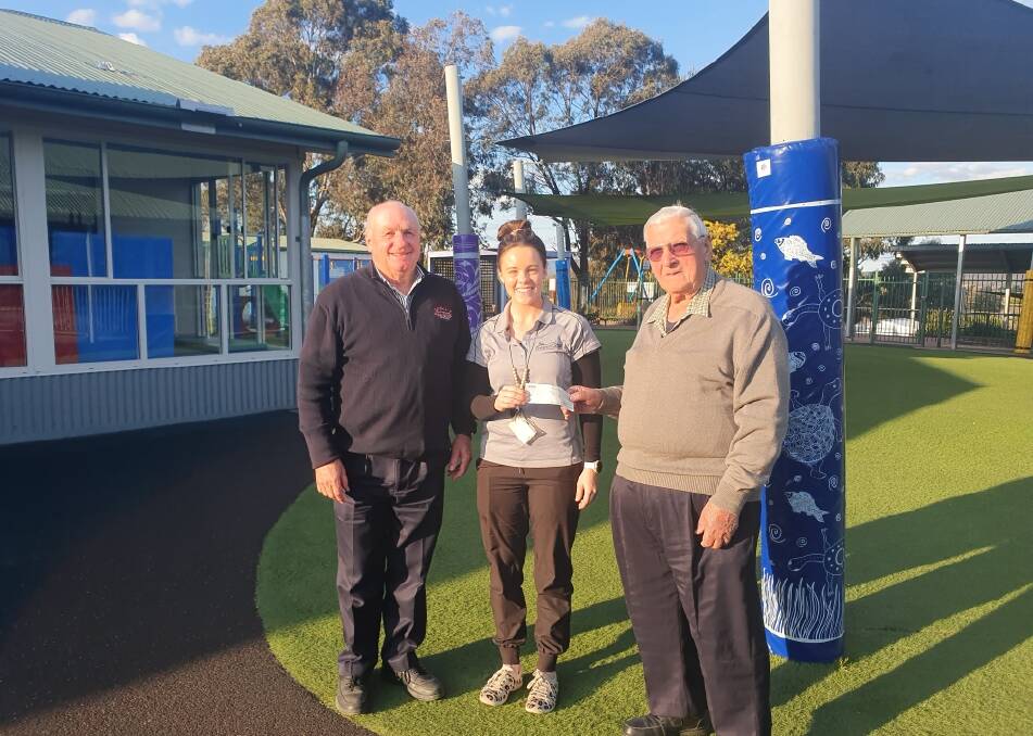 Goulburn Classic and Veteran Car Club Inc president, Chris Shepherd and event coordinator, Tom Marmont recently presented a cheque to Crescent School vice-principal, Courtney Jackson. Picture supplied.