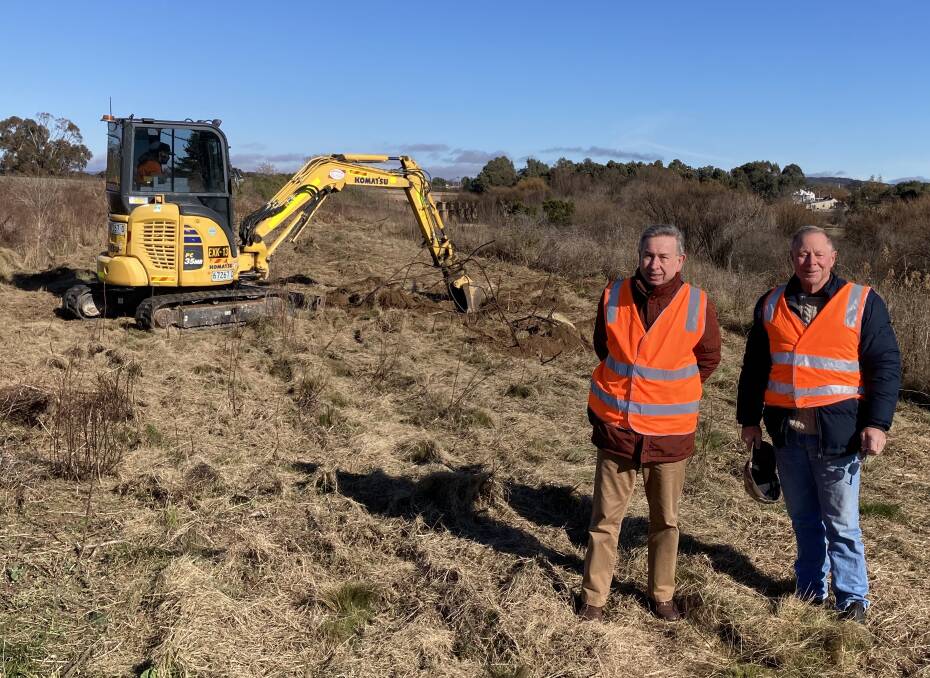 Community Energy for Goulburn (CE4G) members, Peter Fraser and Ed Suttle, are lauding the start of construction on the 1.4 megawatt Goulburn solar farm off Sydney Road. Picture supplied.