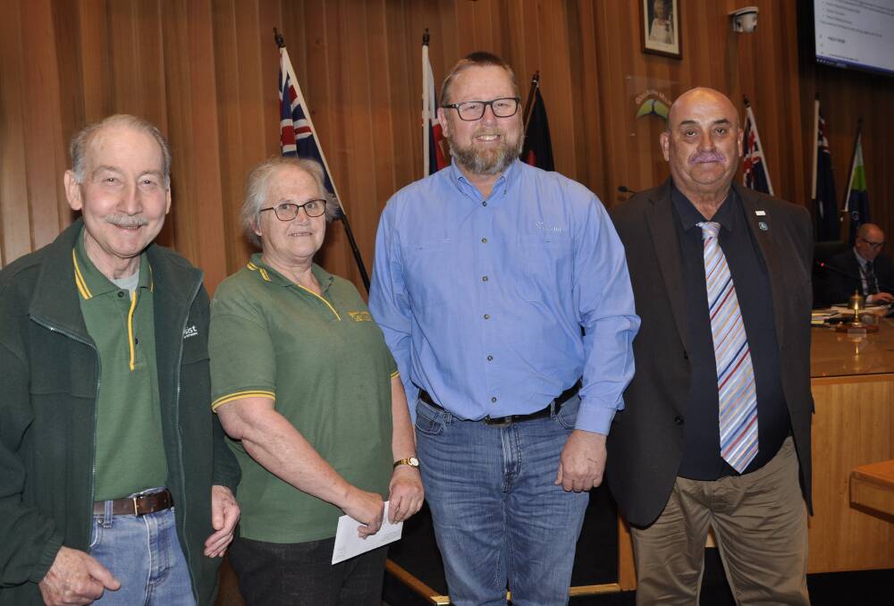 Ian McMurdo and Ruth Doggett from Goulburn CanAssist receiving funds from Hlcim's Wayne Beattie and Mayor Peter Walker following the 2022 Mayoral Charity Golf Day. Picture by Louise Thrower.