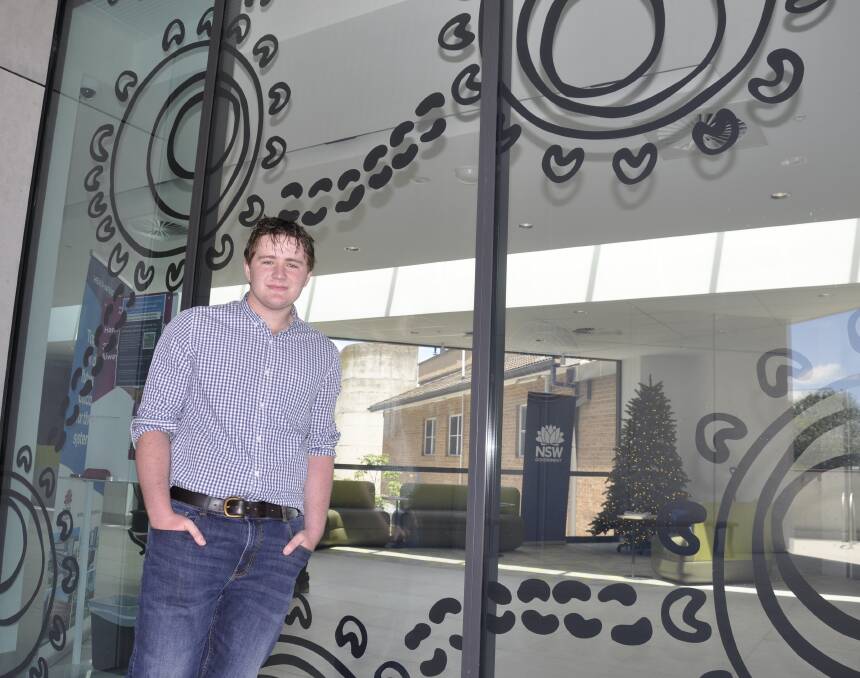 Crookwell teenager harnessed his Yuin heritage to create the Aboriginal art work on the hospital's new main entry. Picture by Louise Thrower. 