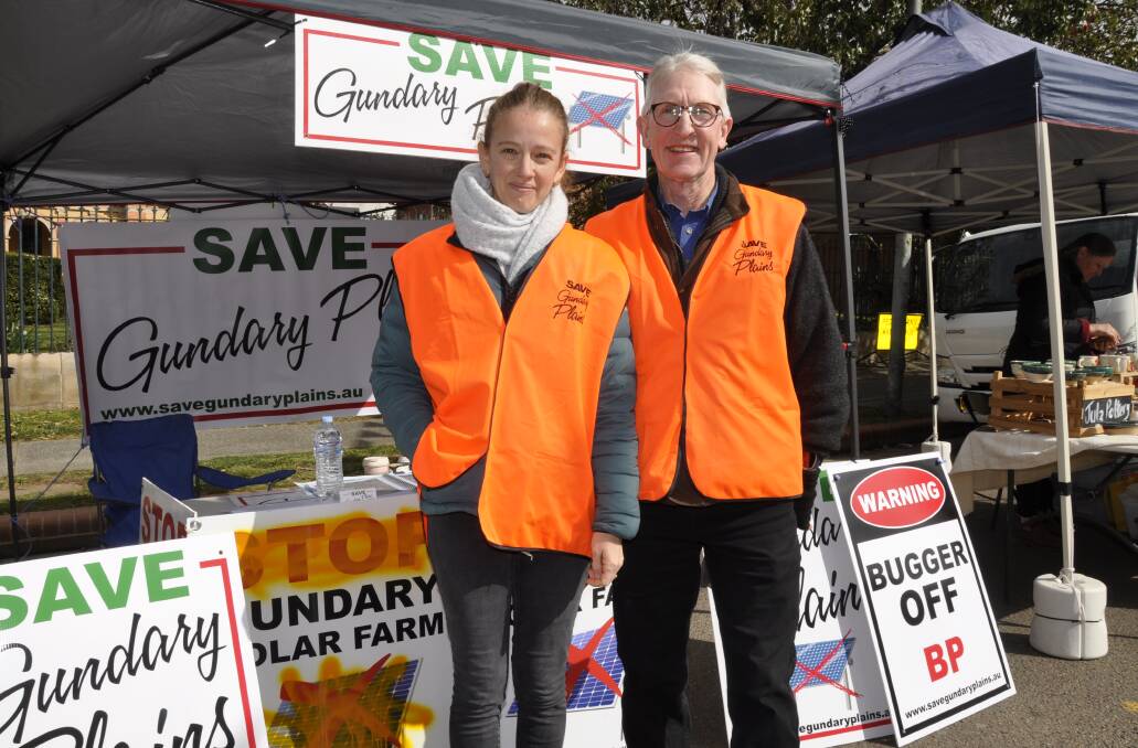 Leigh Swaddle and Stan Moore from the Save Gundary Plains action group handed out information from their stall at Goulburn Rotary markets on Saturday. Picture by Louise Thrower.