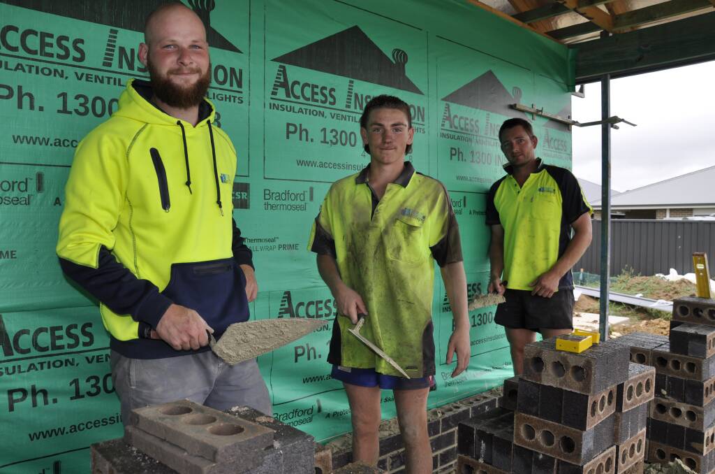 The Goulburn and District Education Foundation has helped young bricklayers, Callum Furner and Damien Gospel with their apprenticeships. They are with business co-owner, Lester Tibbles. Picture by Louise Thrower.
