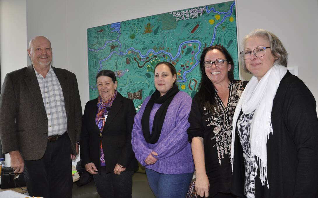 Nurse unit manager, John Gale, Aboriginal Network manager, Marion Knight, Monica Bridge, who completed the Aboriginal Art work in the hospital's foyer (behind), Southern Tablelands Arts executive director, Rose Marin and Kerry Hort. Picture by Louise Thrower.