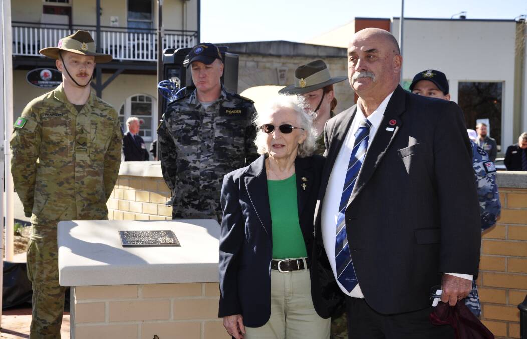 Legacy widow, Kathie Cosgrove and Mayor Peter Walker unveiled a plaque in Belmore Park commemorating Legacy's centenary. Picture by Louise Thrower.