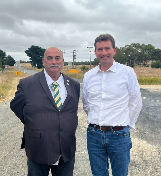 Goulburn Mulwaree Mayor Peter Walker and Labor candidate for Goulburn, Michael Pilbrow at Tuesday's $3 million Currawang Road funding announcement. Picture supplied. 