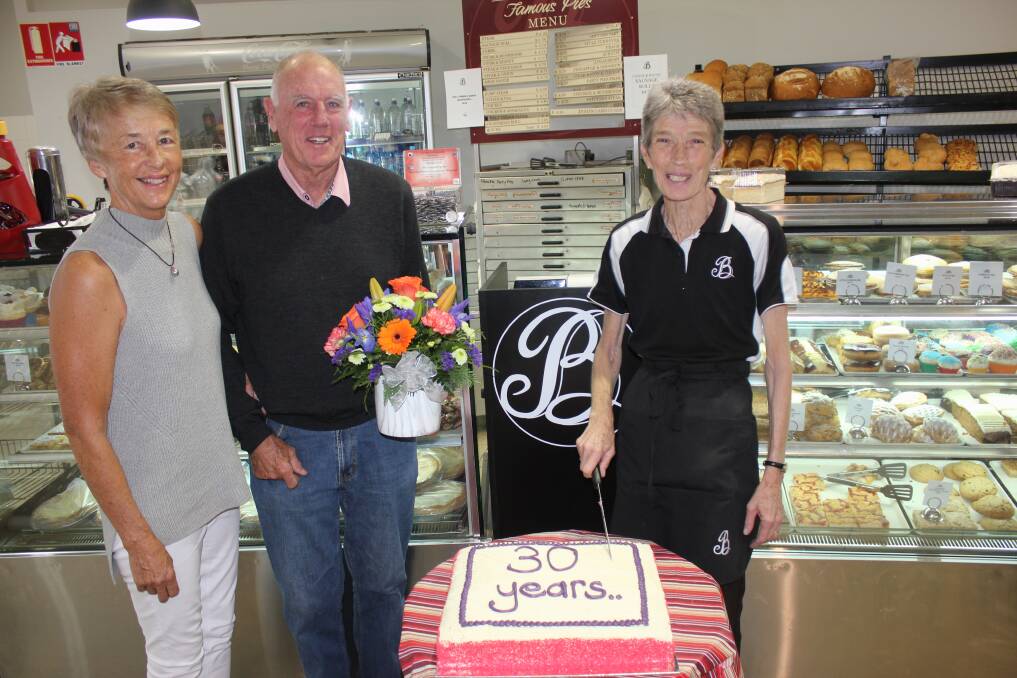 VISIT: Margaret Bryant, Peter Bryant and Kerry Radburn celebrated Kerry's 30 years' service for the company. Photo: David Cole