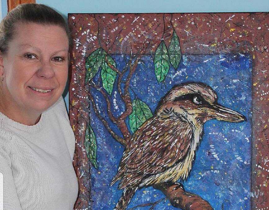 Jodie Munday with one of her works, a Kookaburra, that will be featured in her 'Fight or Flight' exhibition opening at Crookwell's Top Pub on November 9. Picture supplied. 