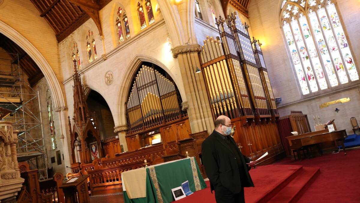 Dr Brett McKern welcomes guests to a special organ recital at Saint Saviours Cathedral in Goulburn on Wednesday. 