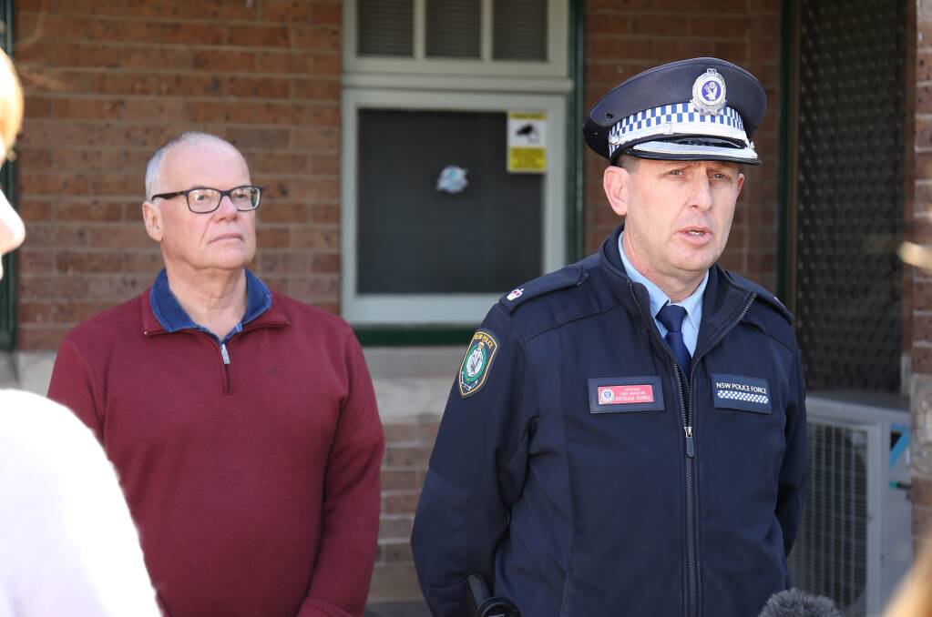 Adrian Quinn left with Detective Chief Inspector Brendan Bernie outside Goulburn Police Station on Friday, July 21. 