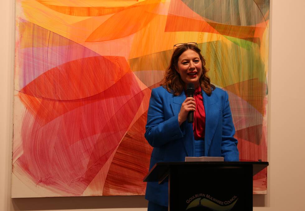 Goulburn Regional Gallery director Yvette Dal Pozzo welcomes guests to the opening of Bright on Friday night. 
