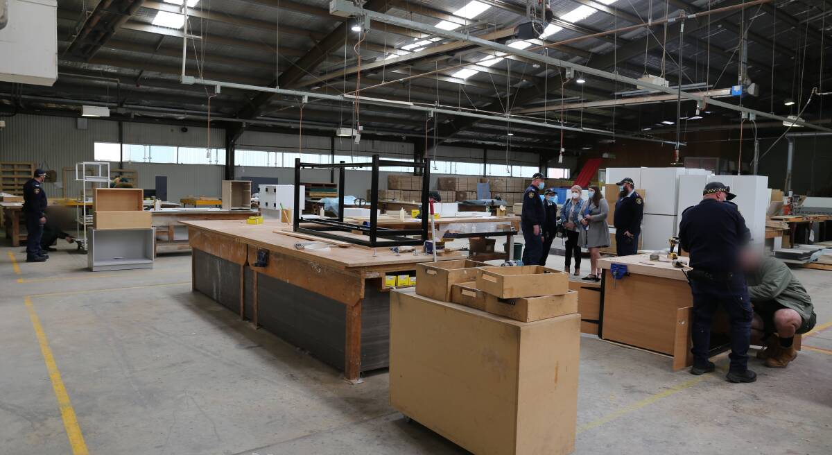 The Goulburn Correctional Centre woodshop houses original tools, the cabinet making line and new equipment that will soon include bed base crafting.