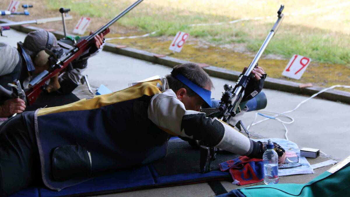 Excellence: Wright's specialty is prone shooting which, as he exhibits in the picture, requires the shooter to lie on their stomach. Photo: Supplied.