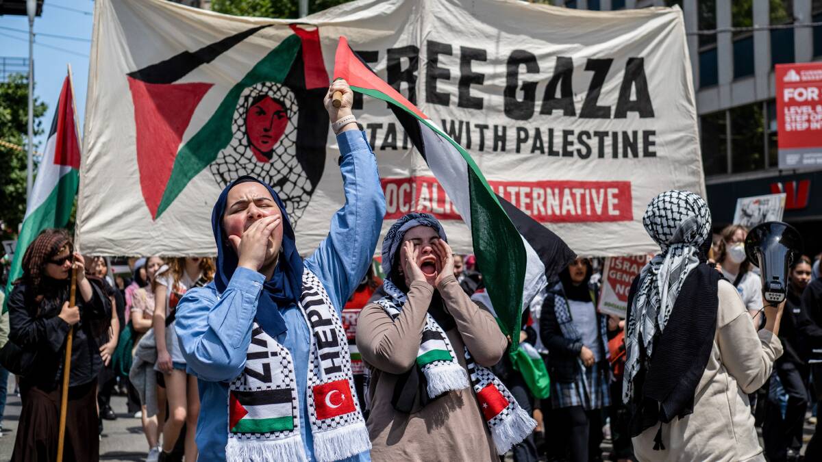 Student demonstrators in Melbourne chant slogans to express solidarity with the Palestinian cause. Picture Getty Images