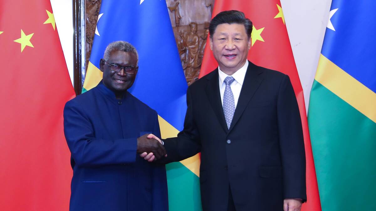 Solomon Islands Prime Minister Manasseh Sogavare and Chinese President Xi Jinping. Picture Getty Images