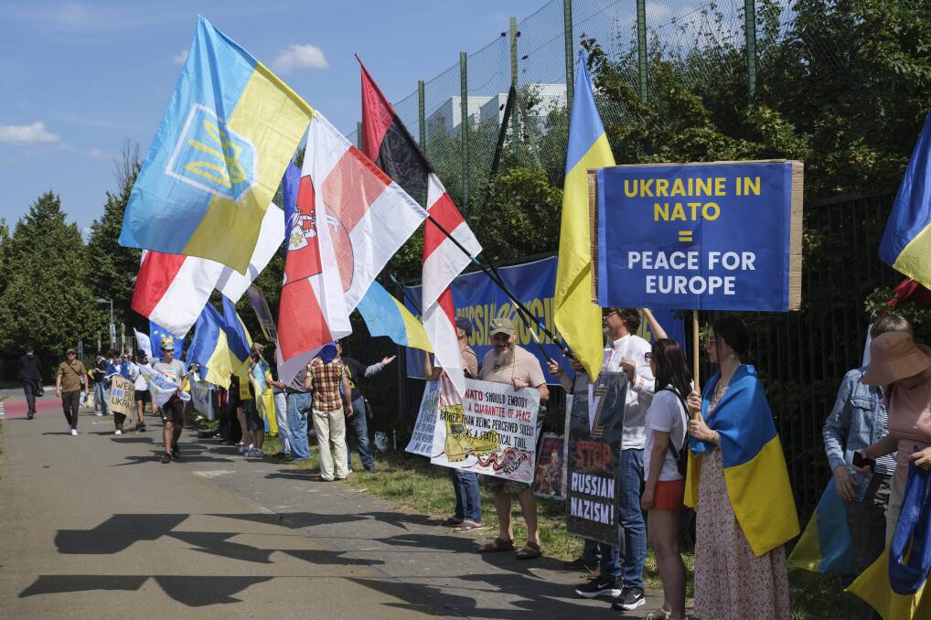 Demonstrators outside the NATO headquarters in Belgium. Picture Getty Images