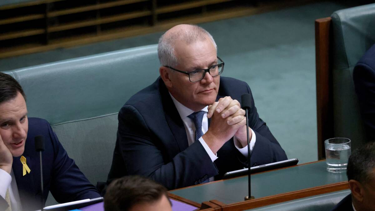 Former prime minister Scott Morrison sitting on the backbench. Picture by James Croucher