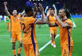 Netherlands players Denzel Dumfries (left) and Nathan Ake celebrate the win over Turkey. (EPA PHOTO)