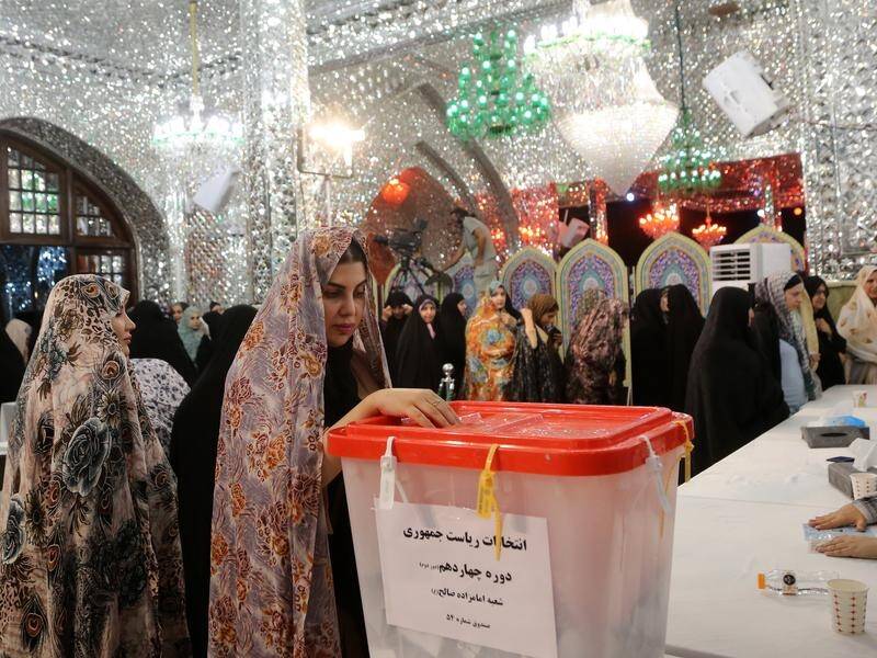 Voter turnout was estimated at 50 per cent in the second round of Iran's presidential election. (EPA PHOTO)