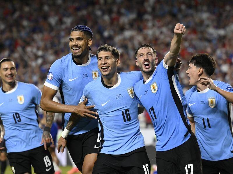 A goal by Uruguay's Mathias Olivera (No.16, centre) spelt doom for the United States in Kansas City. (AP PHOTO)