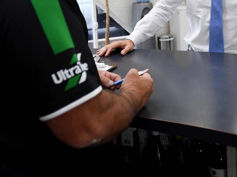 Automotive servicing firm Ultra Tune has been fined after pleading guilty to contempt of court. (Tracey Nearmy/AAP PHOTOS)