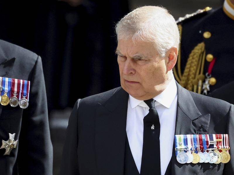 Prince Andrew was booed as he was driven into Westminster Abbey for the coronation. (AP PHOTO)