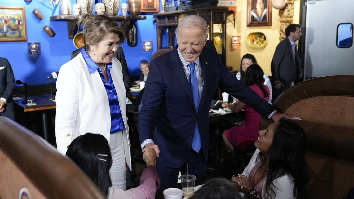 Biden had met guests at a Mexican restaurant in Las Vegas before his COVID-19 diagnosis was revealed (AP PHOTO)