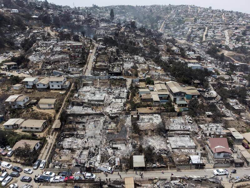 The rubble of burnt out houses after forest fires in Vina del Mar, Chile during February. (AP PHOTO)