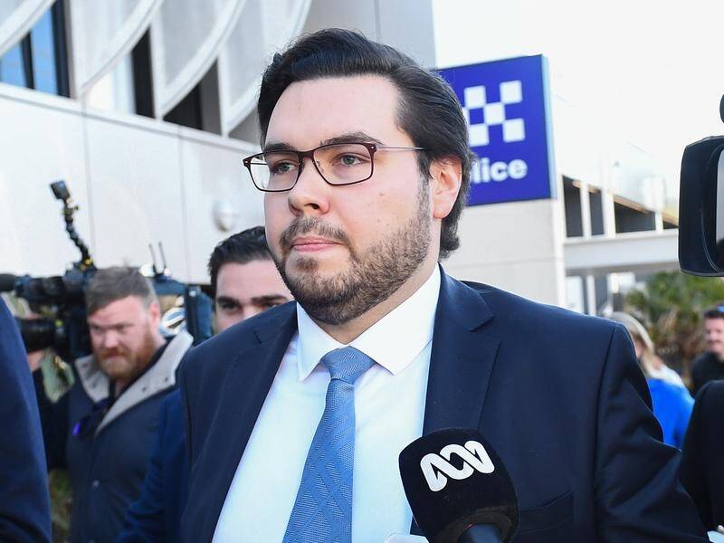Ex-Liberal staffer Bruce Lehrmann will stand trial in Queensland on two rape charges. (Jono Searle/AAP PHOTOS)