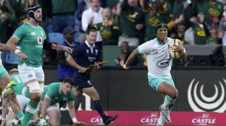 South Africa's Kurt-Lee Arendse breaks to score a try during the win against Ireland in Pretoria. (AP PHOTO)