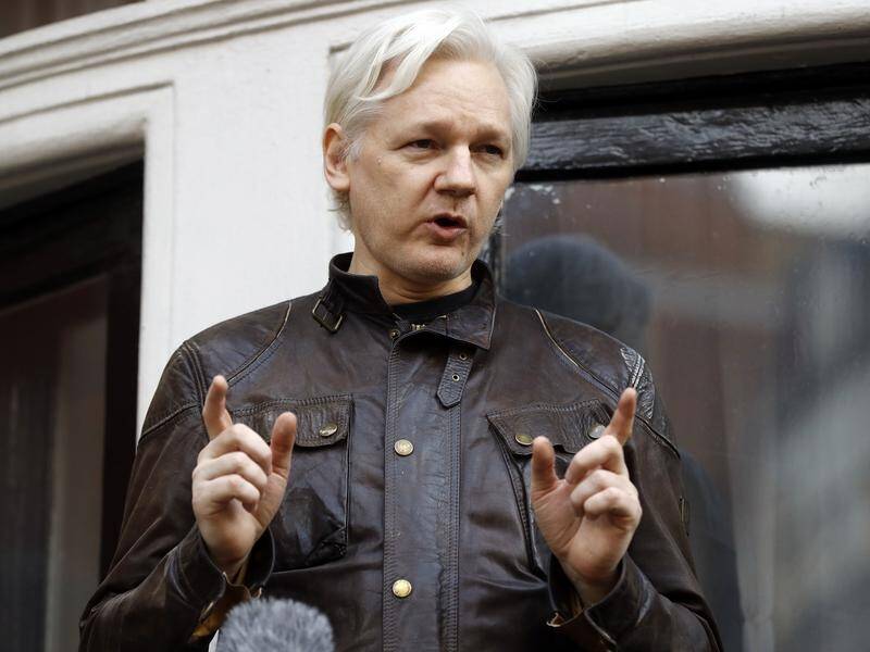 Julian Assange has left the UK after striking a deal with US prosecutors. (AP PHOTO)