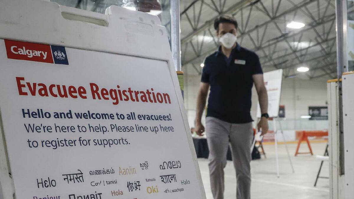 A reception centre is readied for wildfire evacuees forced from Jasper National Park in Calgary. (AP PHOTO)